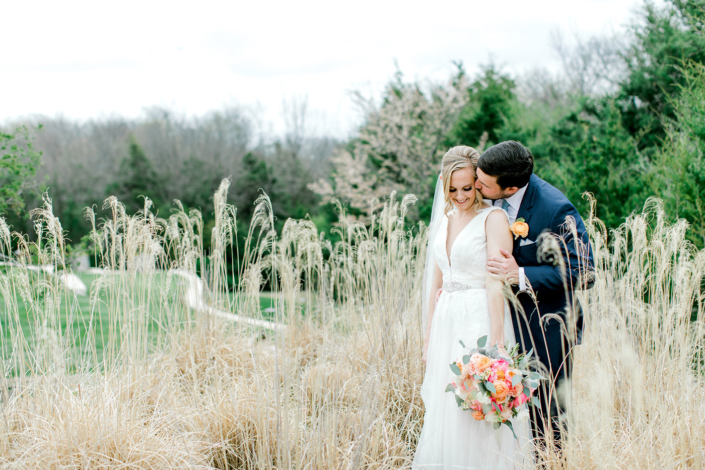 Bride and groom portrait in a Dallas–Fort Worth field at golden hour